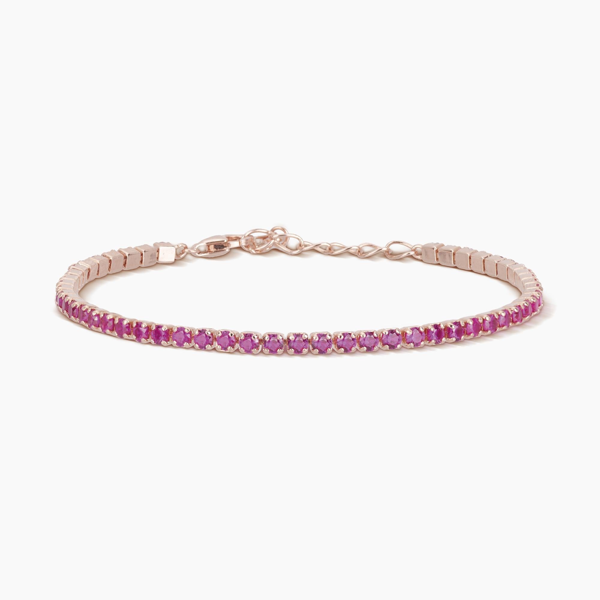 Bracciale tennis in argento placcato oro rosa con rubini sintetici