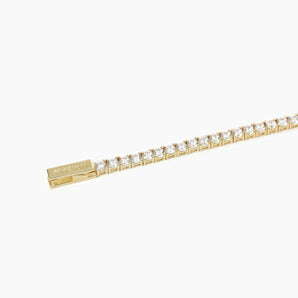 Bracciale tennis dorato con zirconi