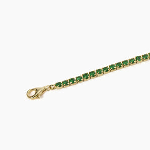 Bracciale tennis regolabile dorato con smeraldi sintetici