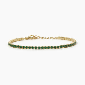 Bracciale tennis regolabile dorato con smeraldi sintetici