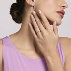 Orecchini a cerchio in argento con smalto viola e ametista sintetica