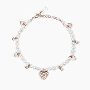 Bracciale con perle conchiglia e charms