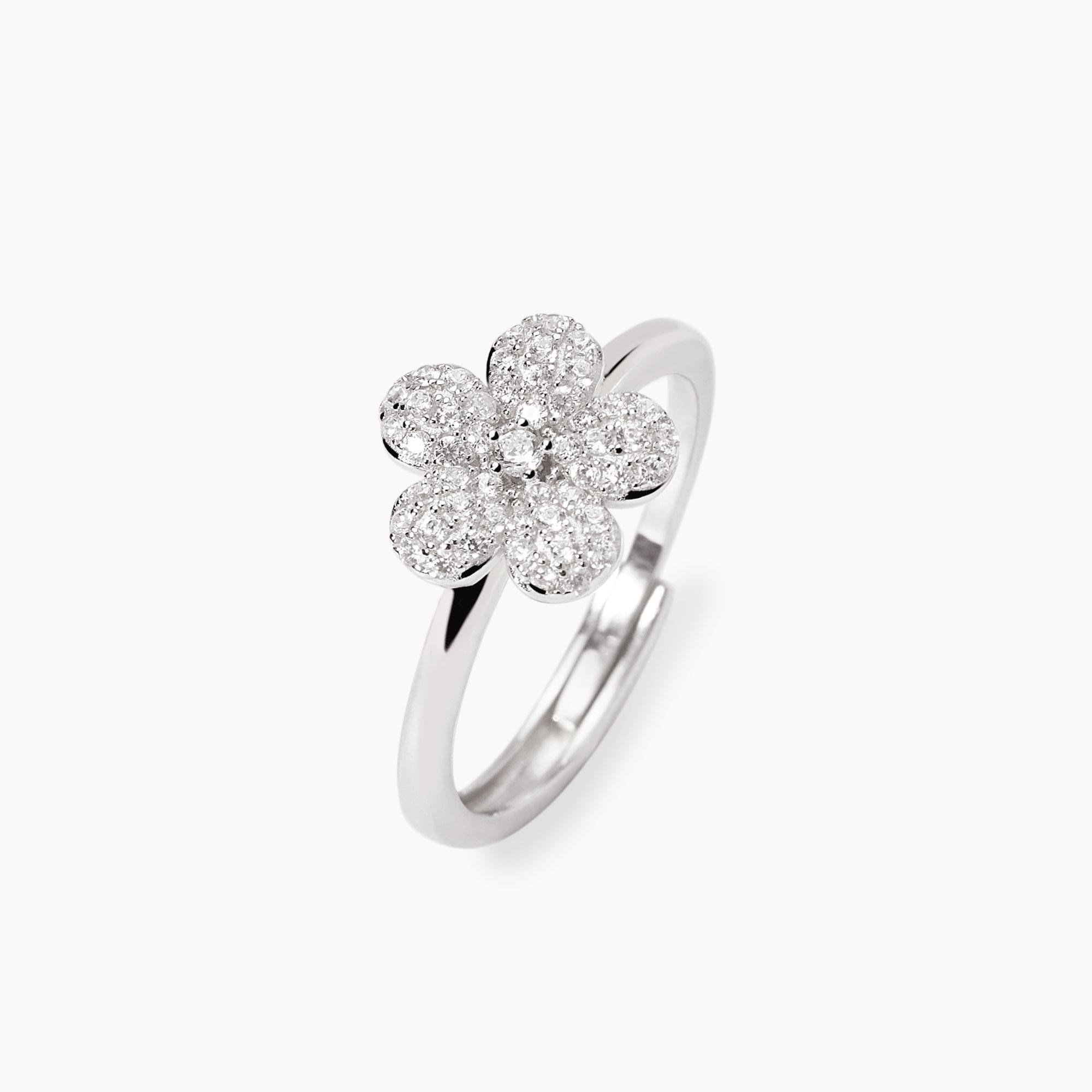 Anello in argento rodiato con fiore e zirconi