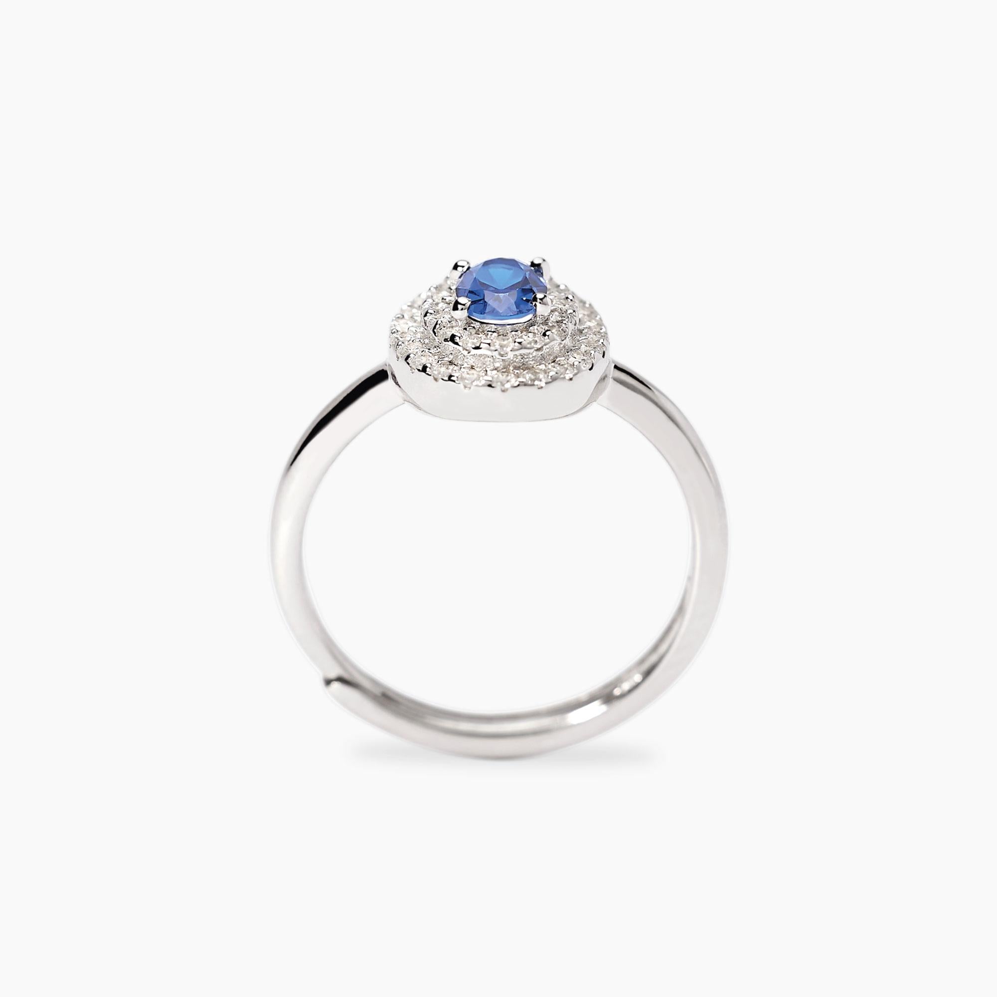 Argento in argento con zaffiro sintetico e zirconi