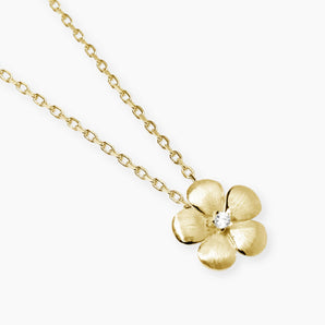 Girocollo con fiore in argento dorato